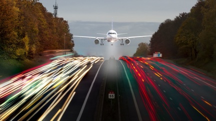 Airplane over the highway