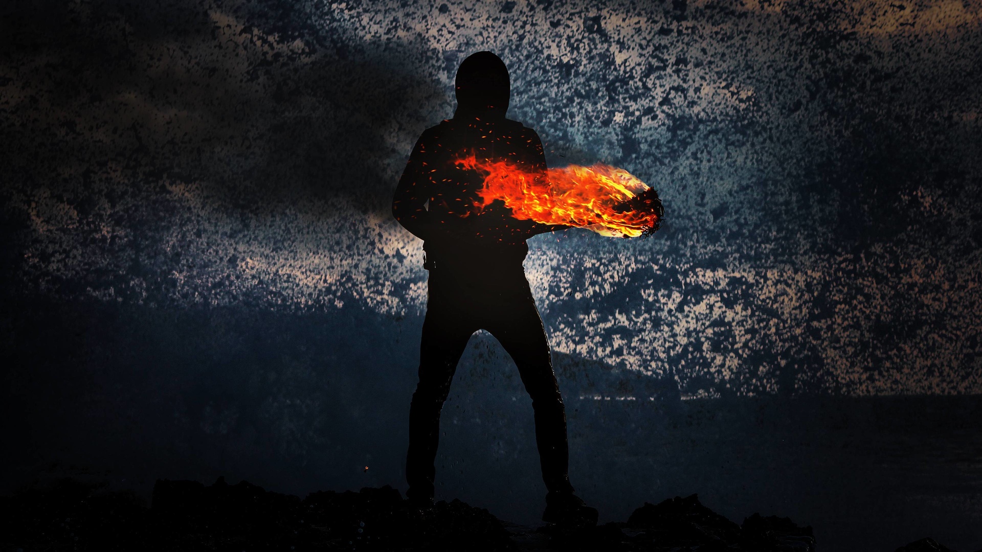 Homme tenant une flamme - Photographie 4K.jpg